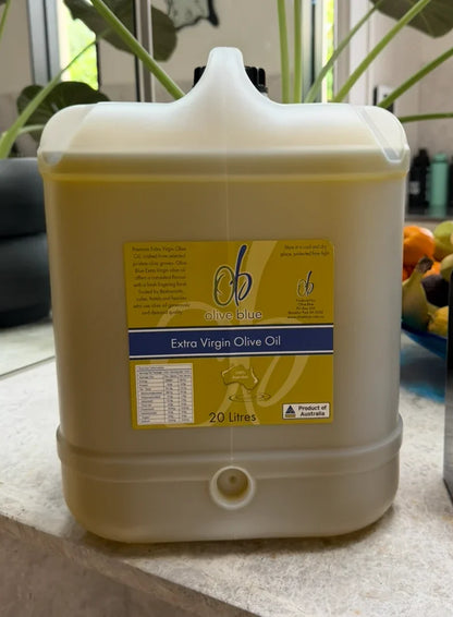 Olive Blue 20L extra virgin olive oil container on a kitchen counter with label visible